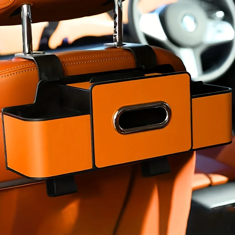 Kopfstützen-Organizer in Orange zwischen den vorderen Kopfstützen